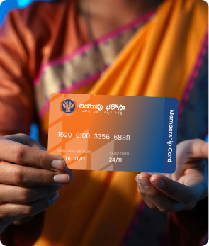 woman holding the Best health membership card in East Godavari for enrolment